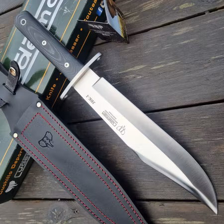 Stor bowie Cudeman JBK-I med svart micarta handtag.