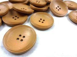 K013 Knapp 31 mm brun