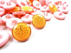 K015 Knapp Emblem 16 mm rosa