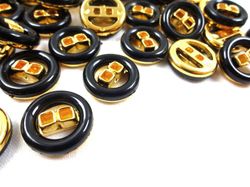 K287 Knapp 18 mm svart/guld