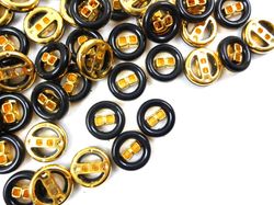 K287 Knapp 18 mm svart/guld