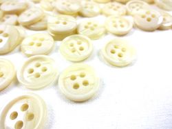 K096 Knapp 15 mm melerad ljusbeige
