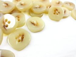 K331 Knapp 18 mm beige melerad