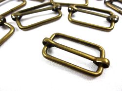 S646 Rörlig spännare metall 25 mm antikguld (10/100 st)