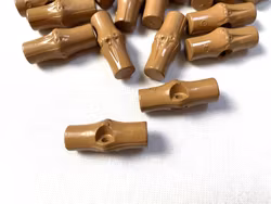 K356 Duffelknapp 27 mm brun