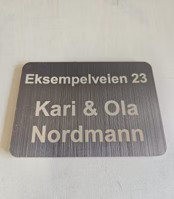 Postkasseskilt børstet stål