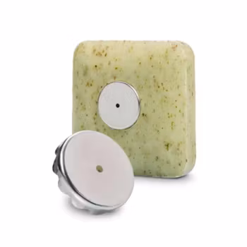 Magnetisk tvålhållare med sugpropp