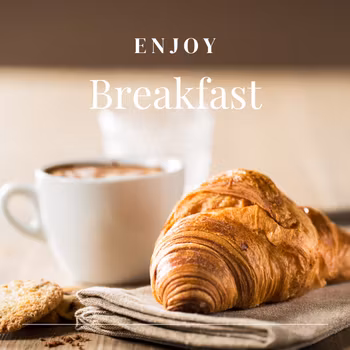 Företagsfrukost fralla med ost och skinka samt stor croissant