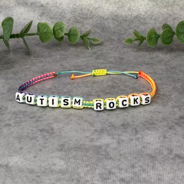 Autism Rocks - Makraméarmband i Regnbågsfärger