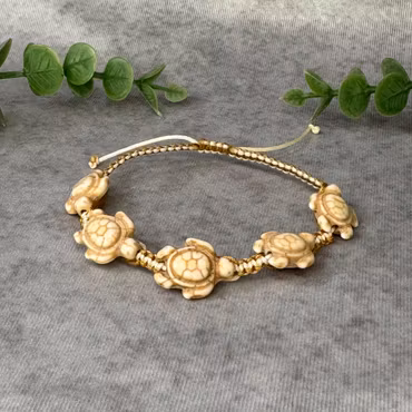 Somrigt armband med sköldpaddor