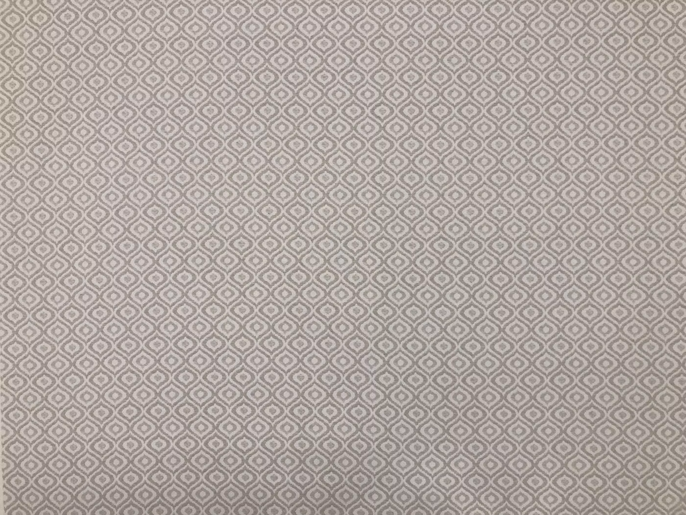 Tapiceria Arcuri beige strukturerat möbeltyg med grafiskt vävt mönster