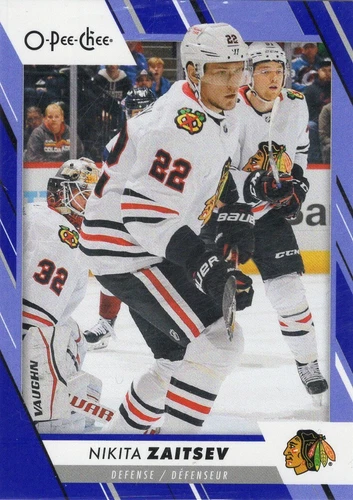 2023-24 O-Pee-Chee Blue #450 Nikita Zaitsev (VV9-NHLBLACKHAWKS)
