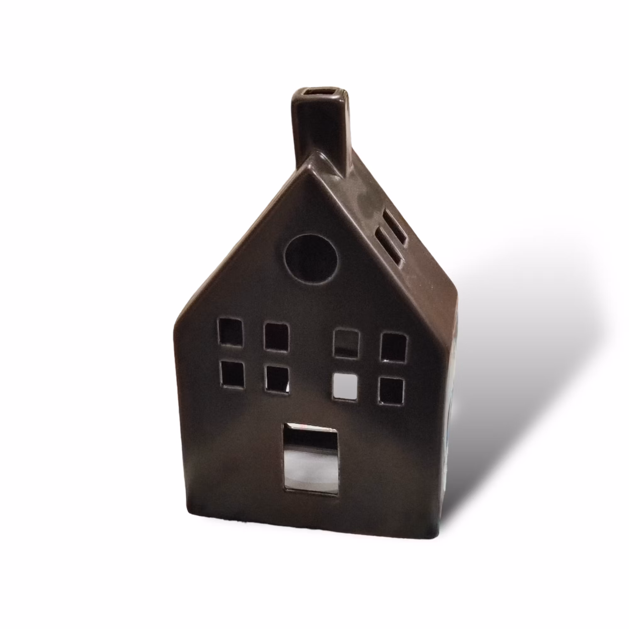 Ljuslykta hus, svart