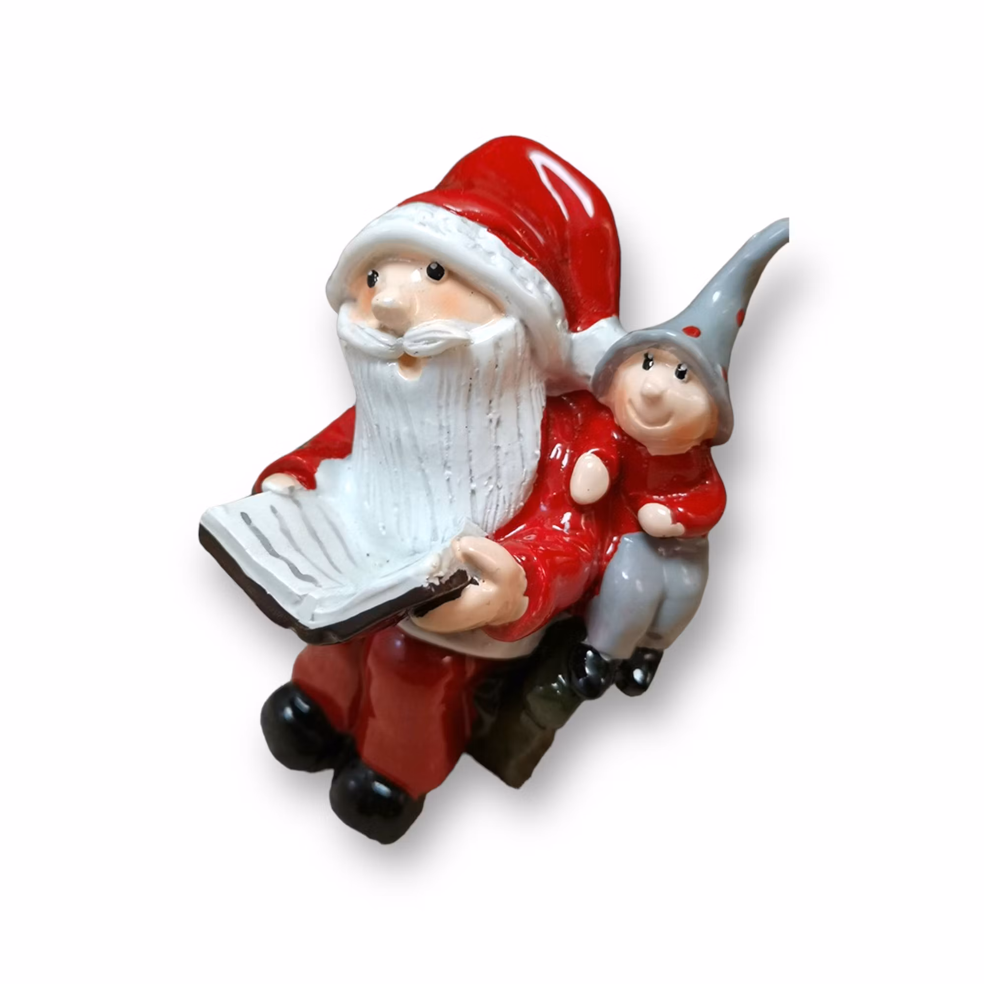 Tomten i fåtölj med nisse