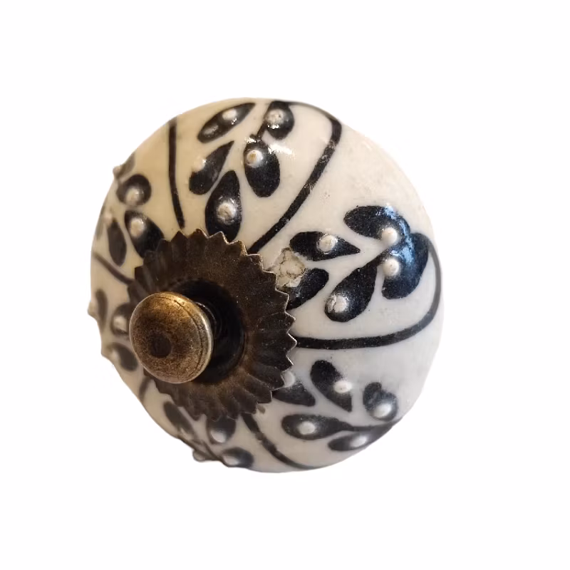 Knopp, dekor på benvit botten