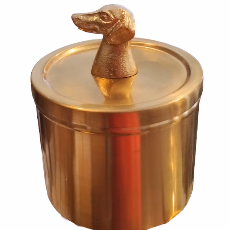 Guldburk med tax på locket