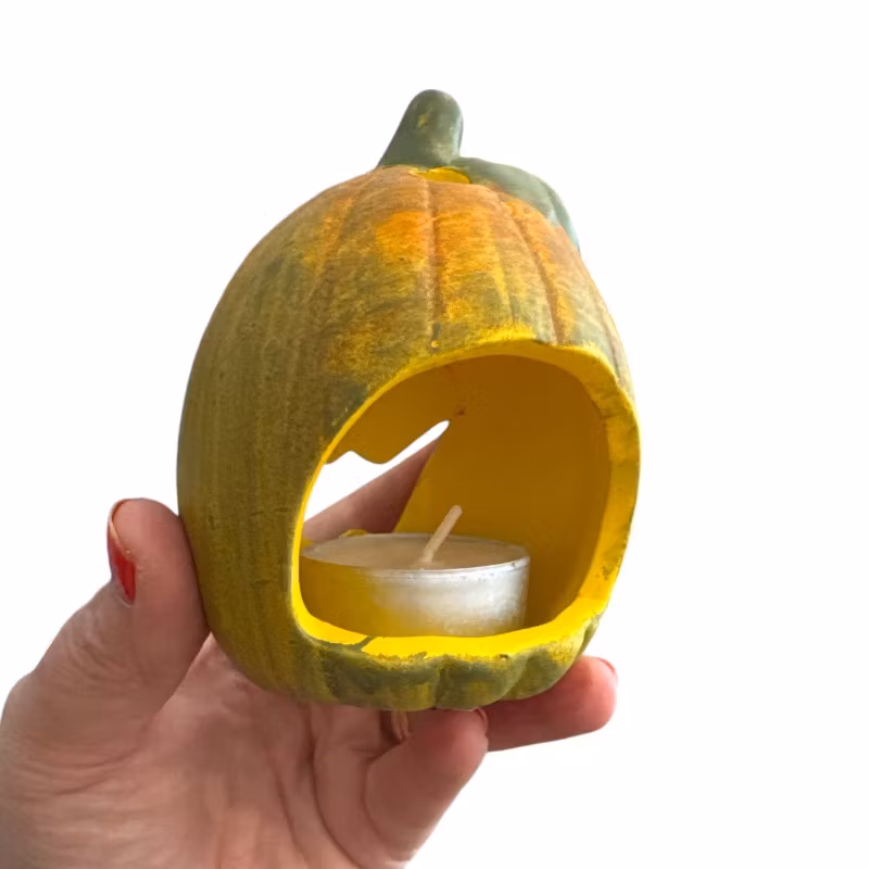 Liten pumpa för värmeljus, gulgrön