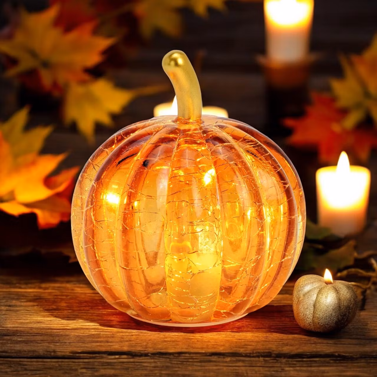 Pumpa i glas med LED-ljus