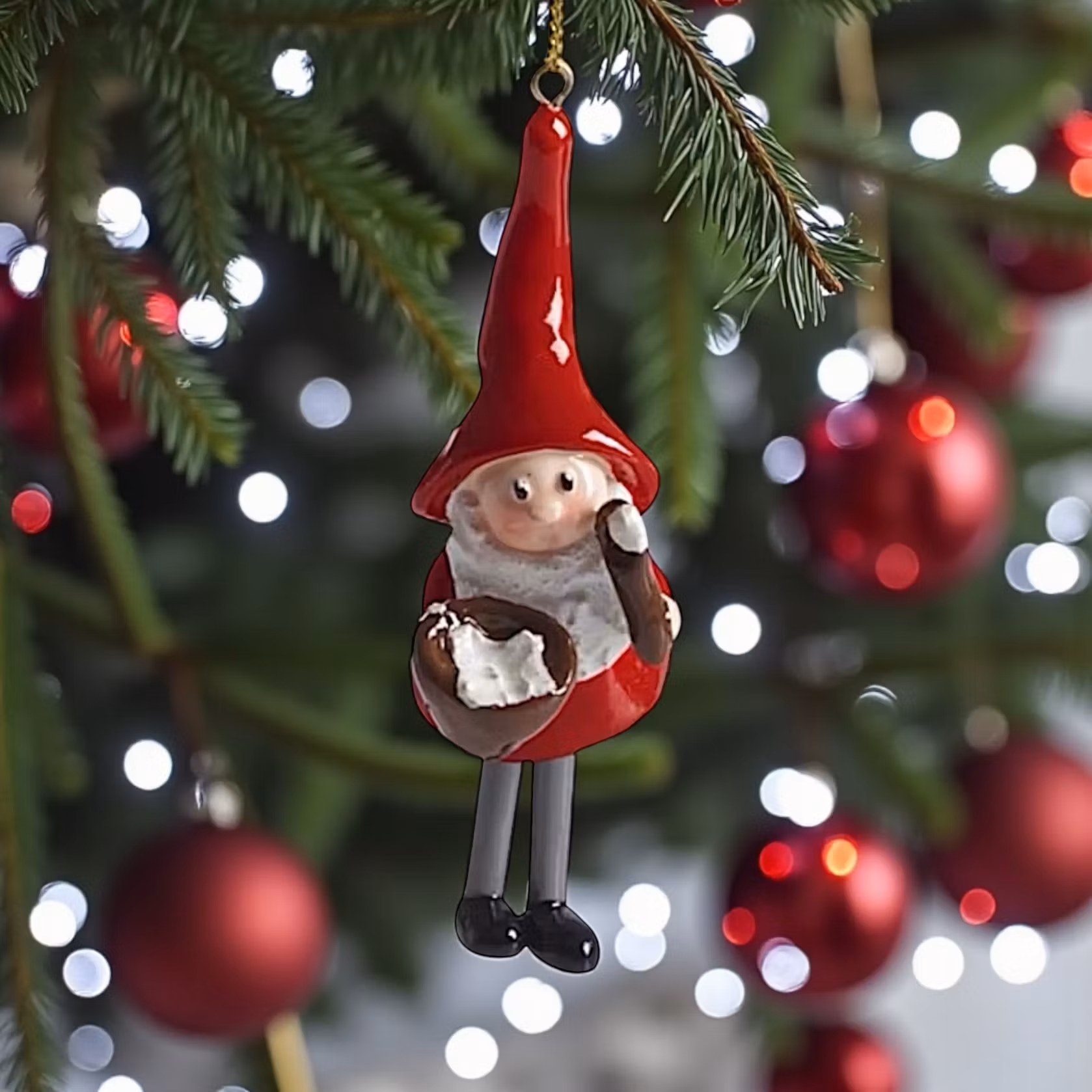 Tomtesson, hängande med grötskål