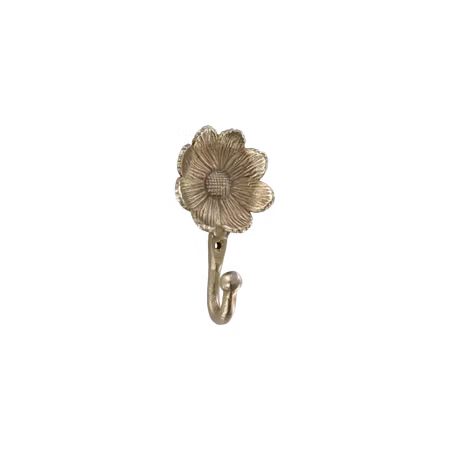 Krok med blomma i mässing