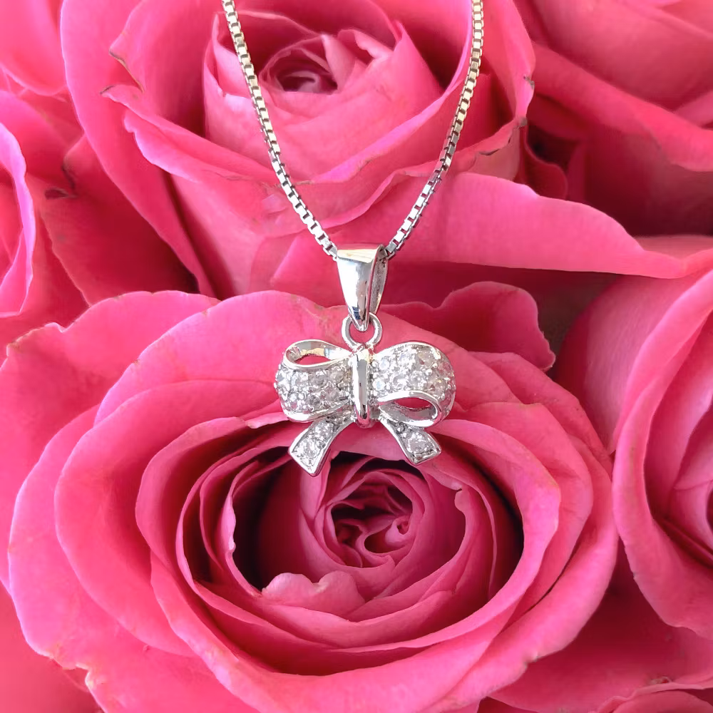 Doppresent flicka - Silverhalsband ROSETT