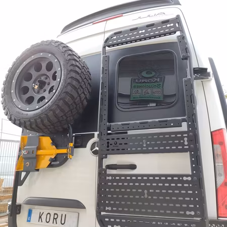 Rörformad tillbehörshållare 180º gångjärn (Koru Solutions)