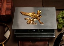 Casket with gilded Sphinx on hinged lid from Munka Tenn
