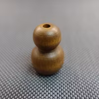 Lintofs RUNDAD i TRÄ - LITEN 27x20 mm 2514 Tiger Eye (A15H)