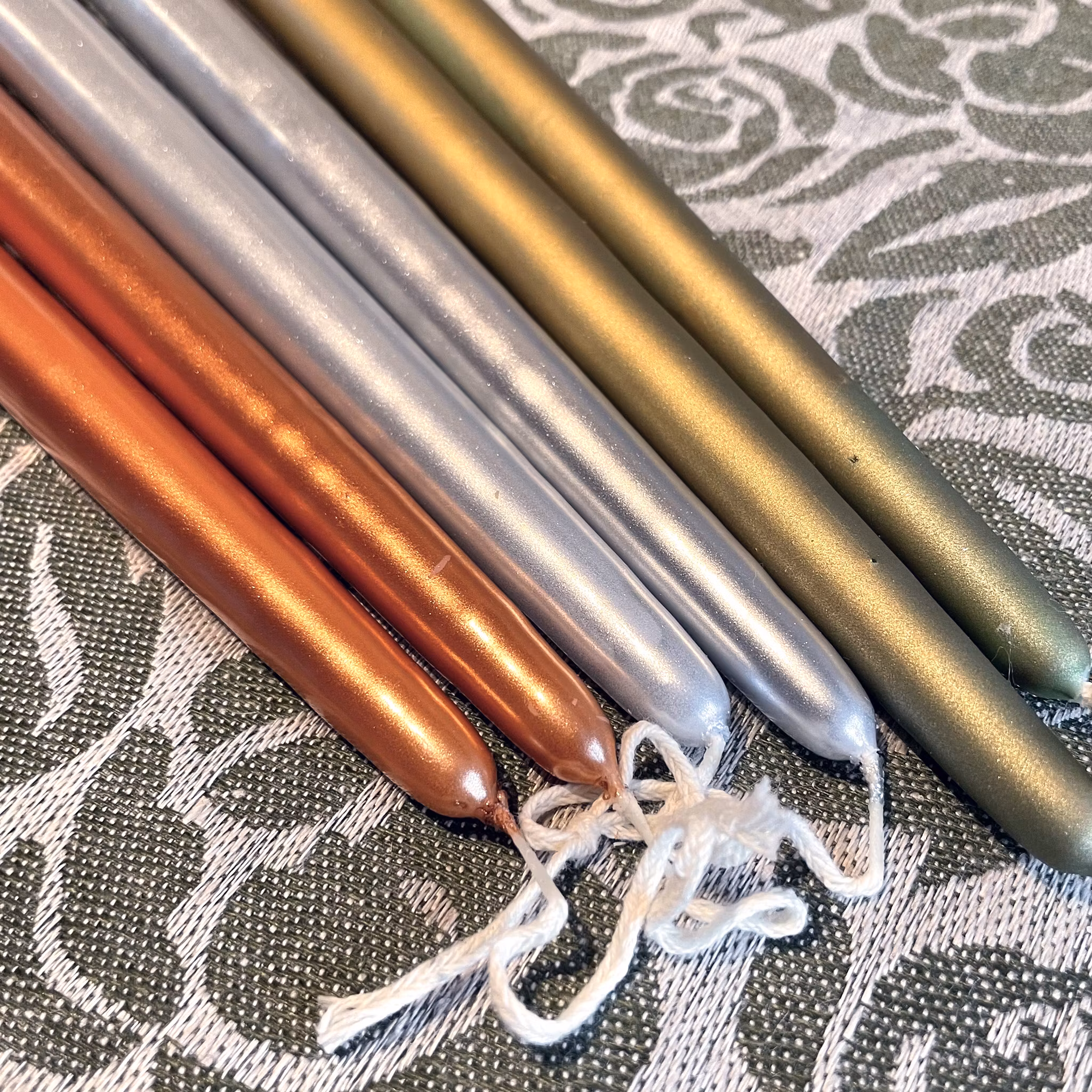 Antique metal candle