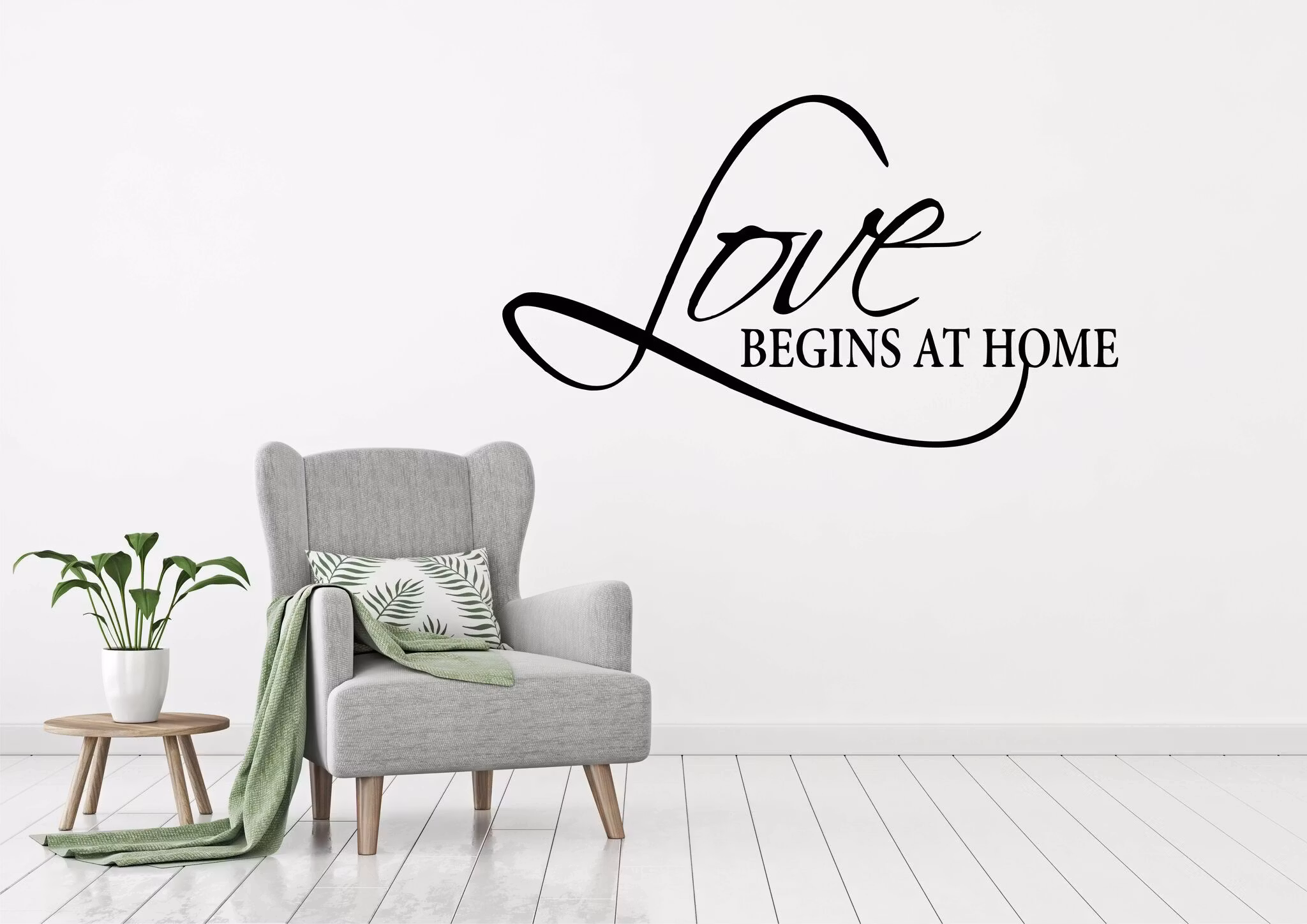 Väggord Love Begins at Home