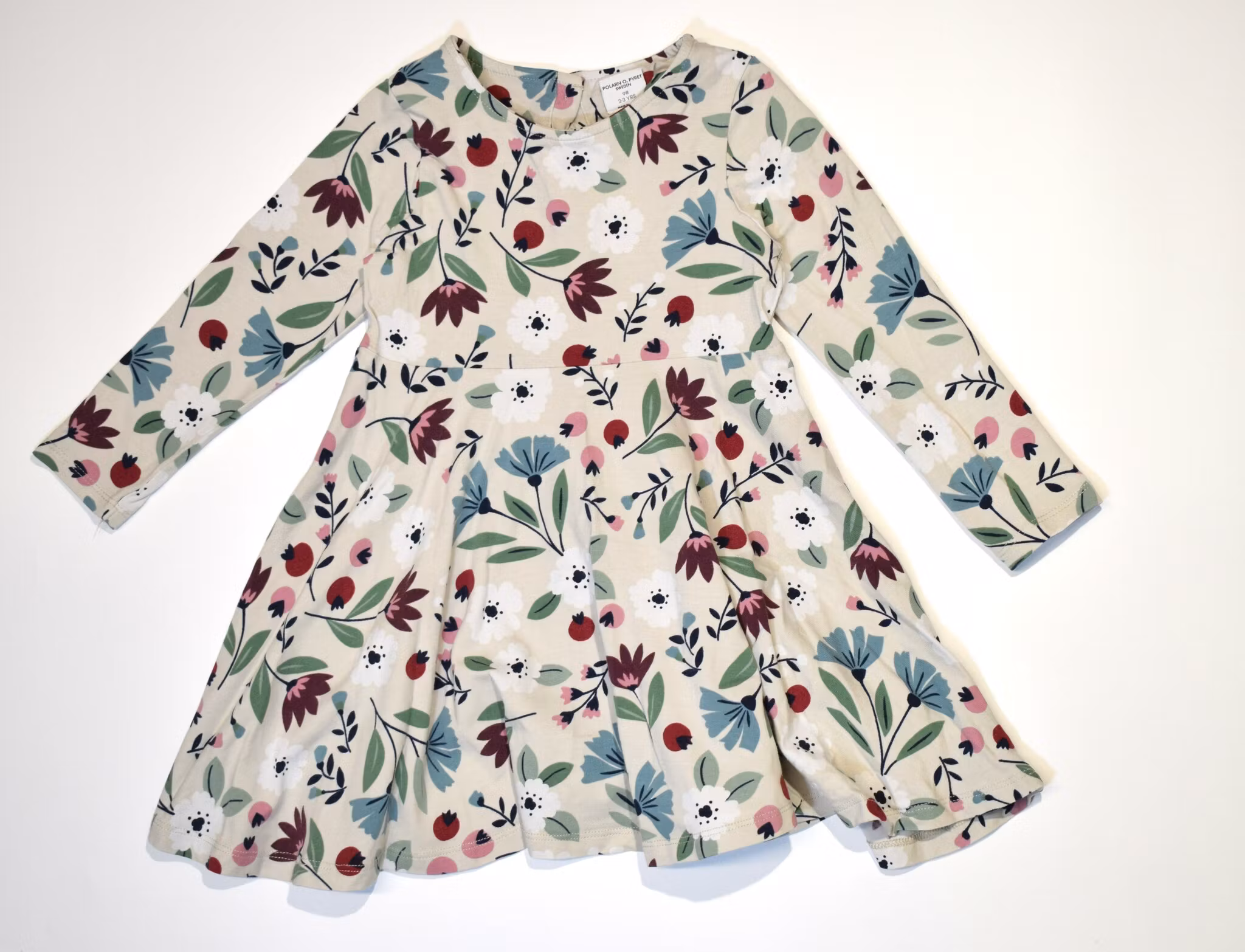 Långärmad snurrklänning, storlek 98