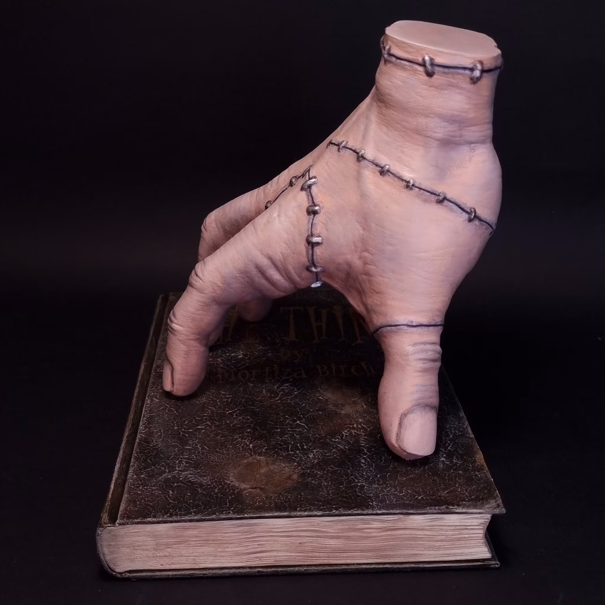 Creeping curiosities in book form – 1:1 sculpture by Mortiza Birch
