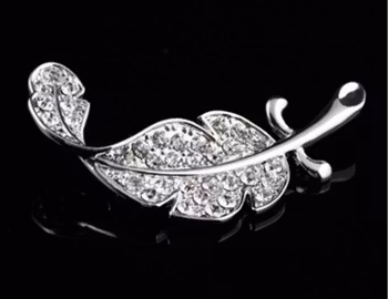 Silverpläterade Strass Brosch