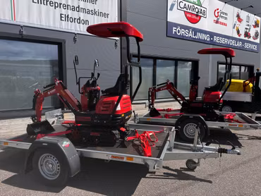 Blue Bird MEX 600 Grävmaskin