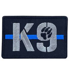 Tygmärke K9 med tass