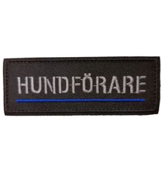 Tygmärke hundförare grå text