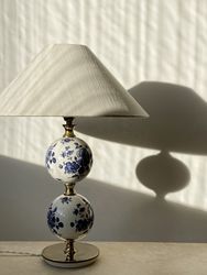 Stilarmatur Table Lamp in White Porcelain with flowers. 1960s.