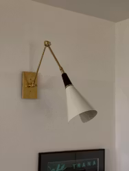 Pair of Brass Wall Lamps in the Style of Stilnovo, black & white.