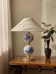 Stilarmatur Table Lamp in White Porcelain with flowers. 1960s.