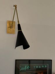 Black Wall Lamp in the Style of Stilnovo.
