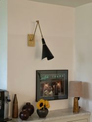 Black Wall Lamp in the Style of Stilnovo.