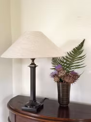 Neoclassical Table Lamp in patinated metal. 1940s.