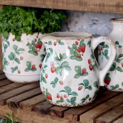 Blommig kanna vintage Jordgubbe