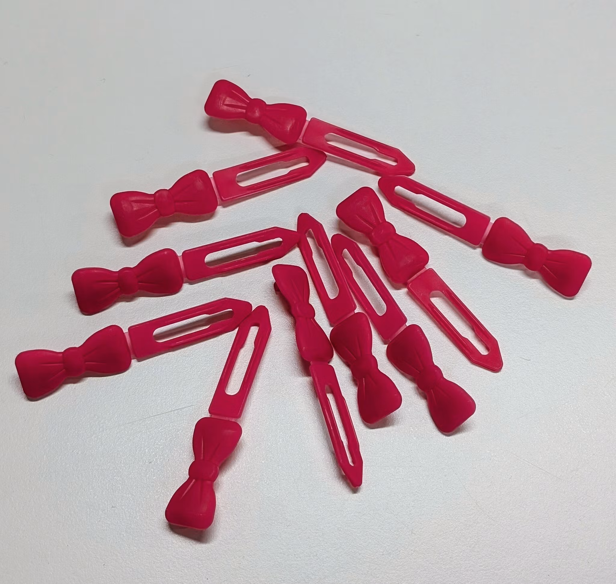 10 pack ceriserosa spännen 3,5 cm