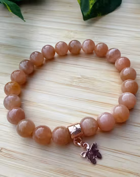 Solstens armband med fjäril