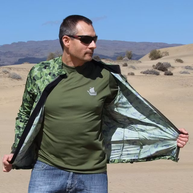 Flowing fabric in the desert wind during photoshot of a Running Jacket M90 MI.