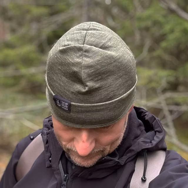 Beanie Merino Wool Green from TAC-UP GEAR seen mounted on a model and showing the top
