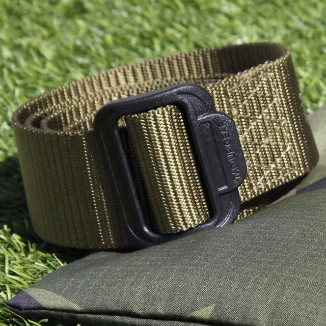 Photo in the sun of a rolled Expedition Belt Green.