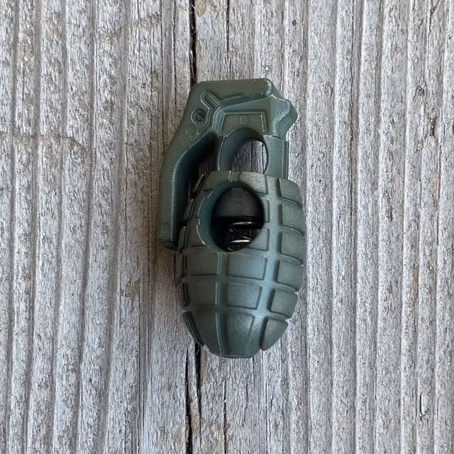 A Cord Lock Grenade Green from TAC-UP GEAR seen full front