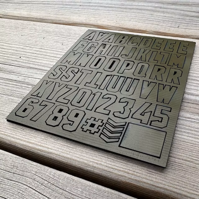 DIY Alphabet and Number Hook Patch Set Green viewed from a low angle